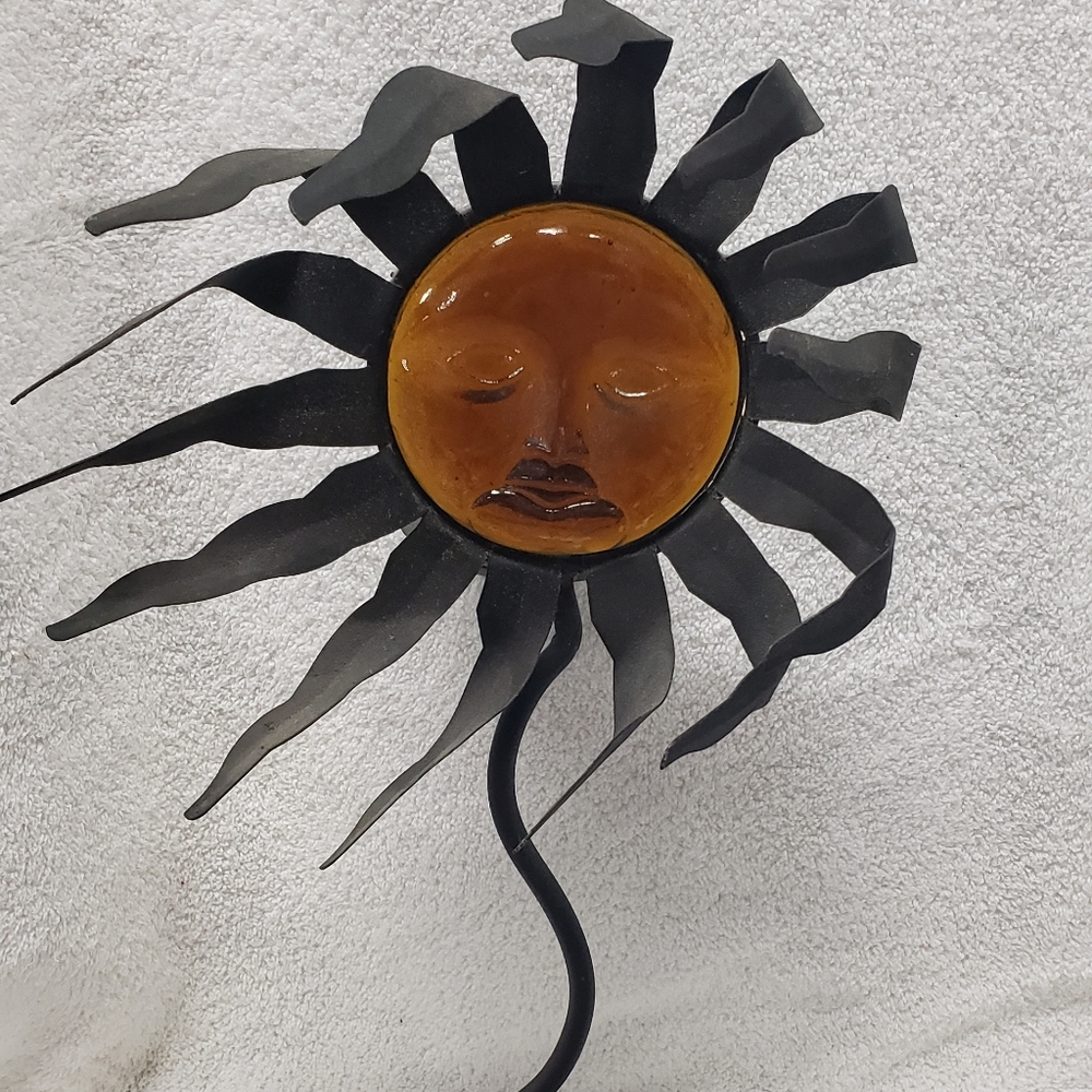 Wrought iron and glass sun candle holder